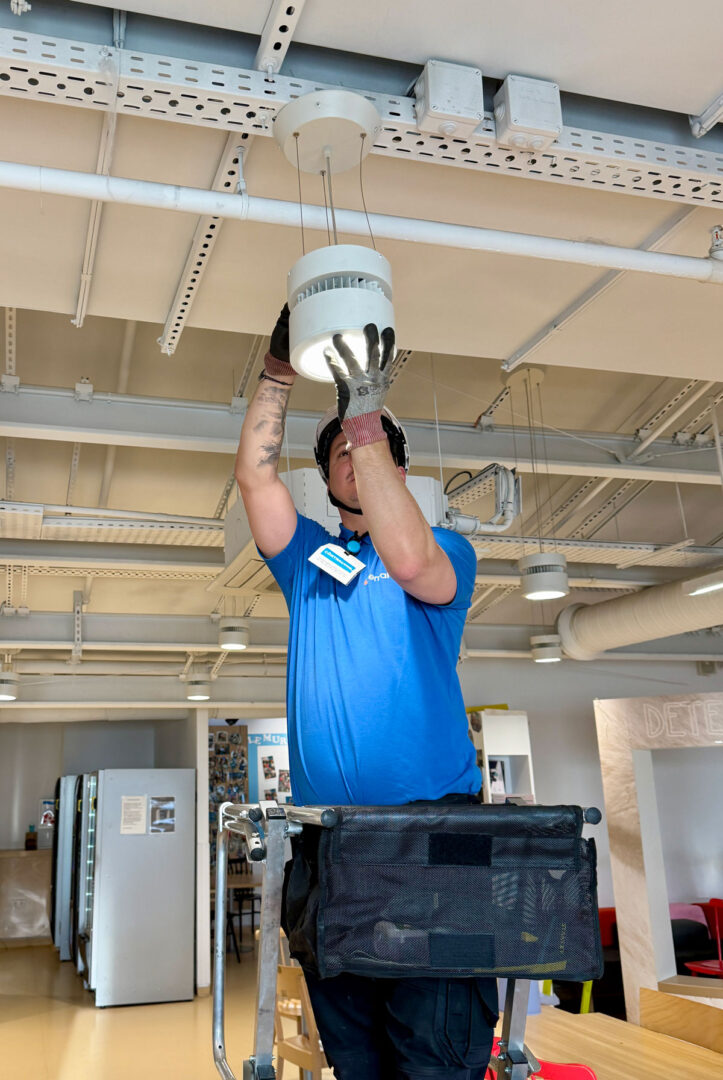 Emalec technician working on an electrical system